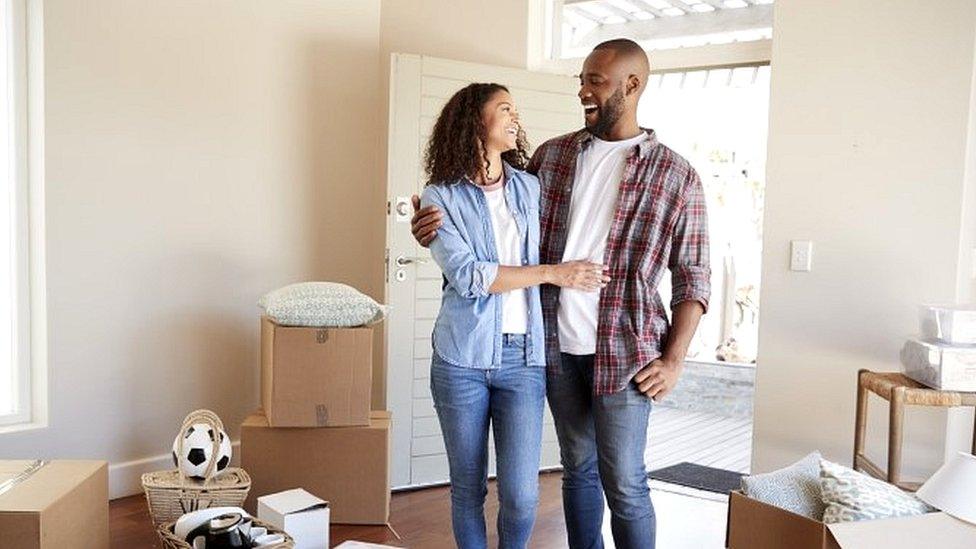 Couple move into new home