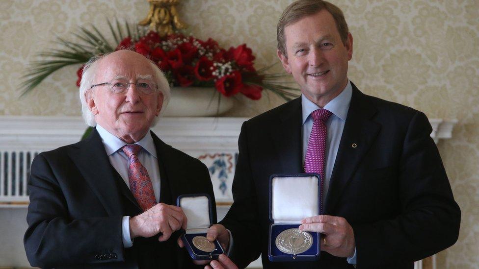 Irish President Michael D Higgins presented the Seal of the Taoiseach and Seal of Government to Enda Kenny after his re-election