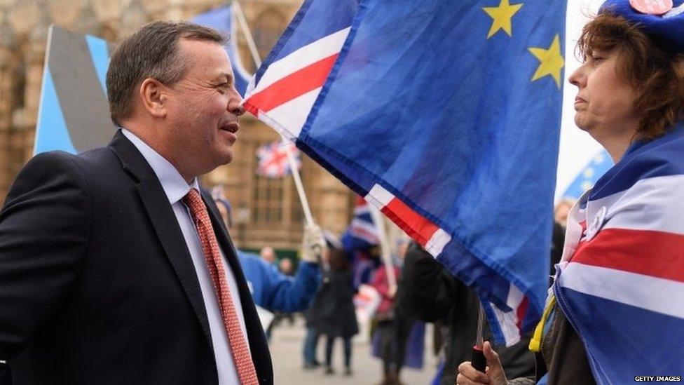 Arron Banks and a anti-Brexit demonstrator in Westminster