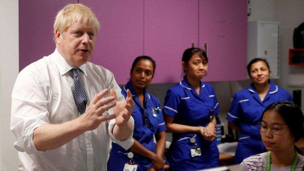 Boris Johnson with NHS staff