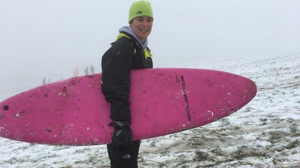 Lyn Ward with surf board