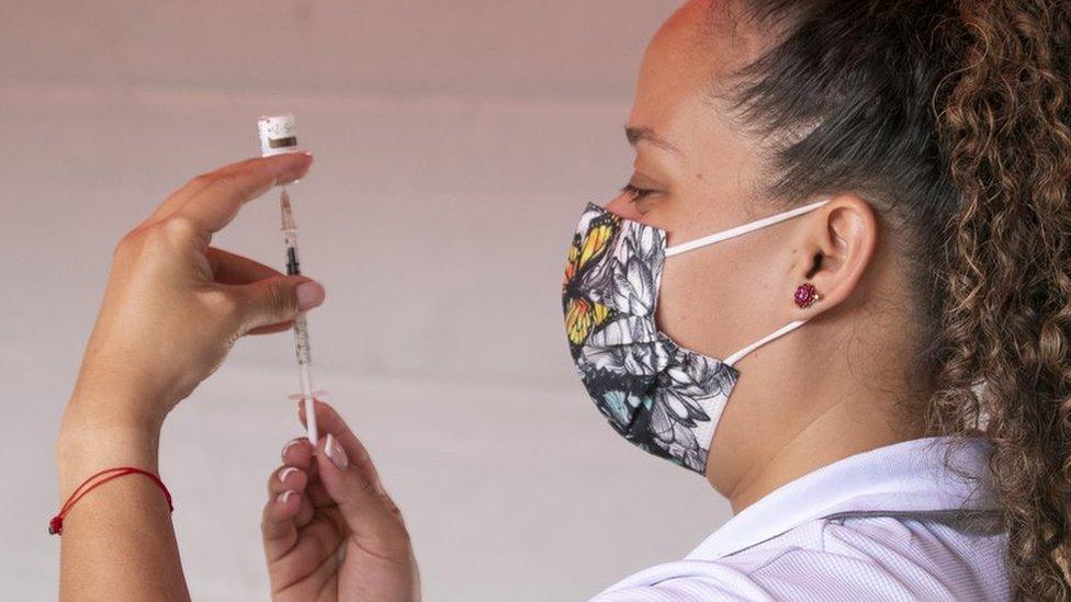 Nurse prepares the vaccine as part of the national vaccination campaign against Covid-19 on 7 May in Escazu, Costa Rica