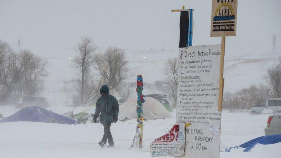 protester in snow storm