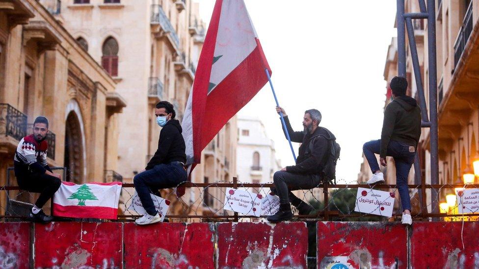 People protesting against Lebanon's political elite and the country's economic collapse in Beirut, Lebanon (12 March 2021)