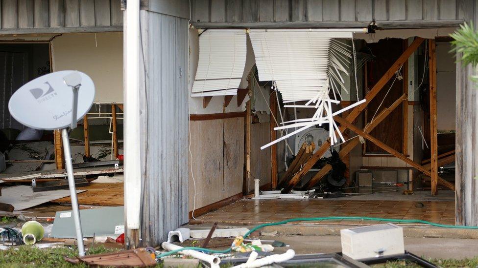 The front of a residence that was destroyed by Hurricane Hermine is seen, Friday, 2 September 2016, in Cedar Key, Florida