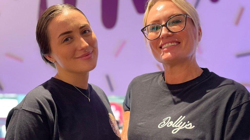 Trader Charlie Smark (left), 23, runs her stall Dolly's Desserts with the help of her mum, Janine