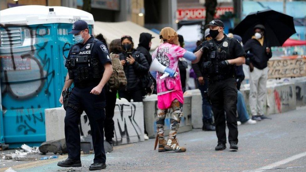 Police talk to protesters in the Capitol Hill Occupied Protest zone. Photo: 28 June 2020