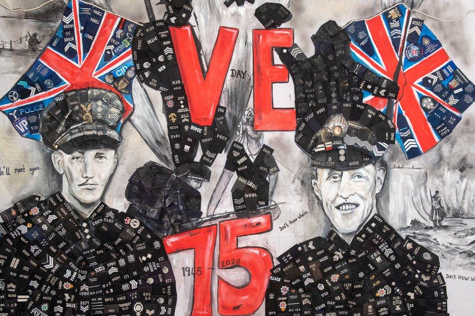 A large piece of art showing Capt Sir Tom Moore and Grenadier Guard Lance Sergeant Eric Presland