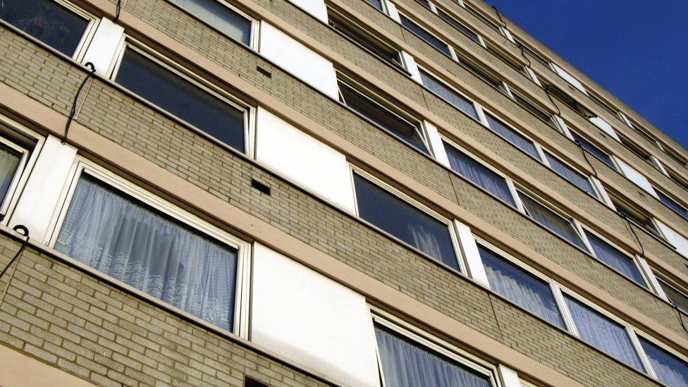 File image of a high-rise block of flats in Camden, as seen from below.