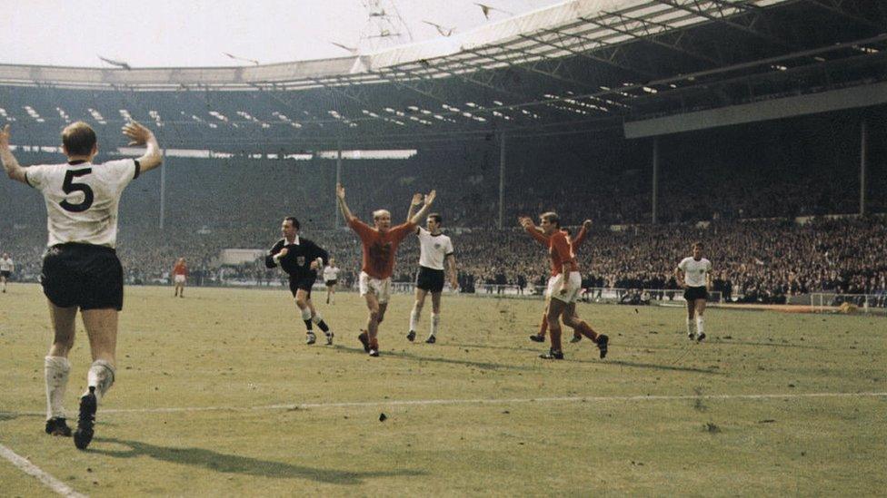 German players protest against referee awarding England's third goal