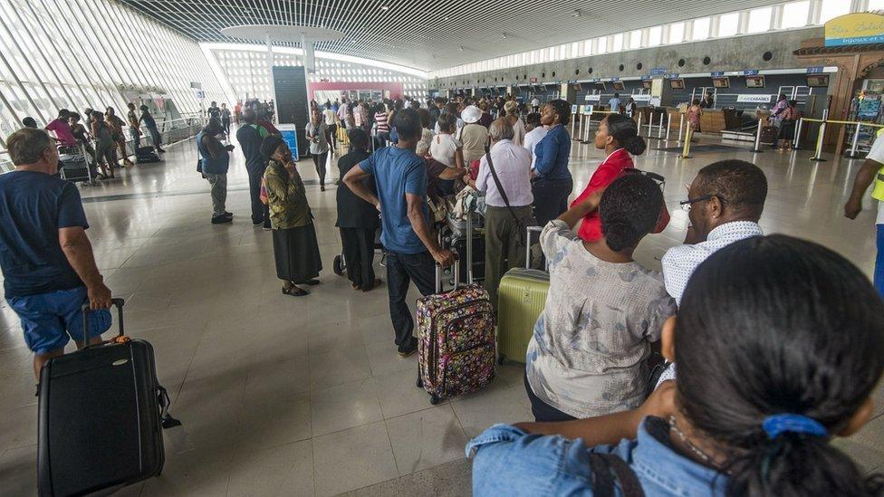 People lining up at airport