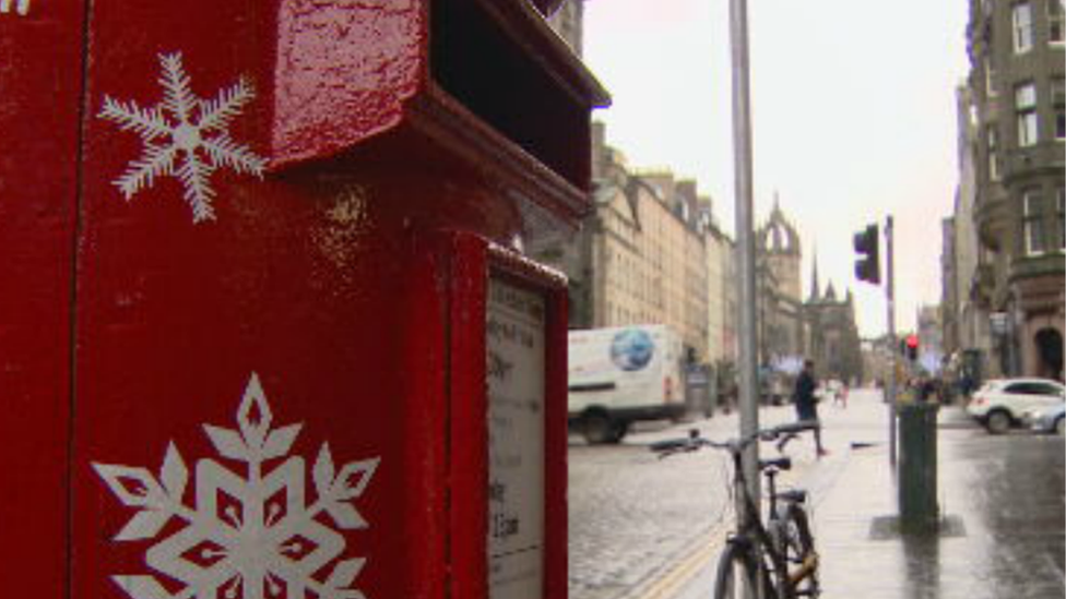 Snow-flake painted post-box