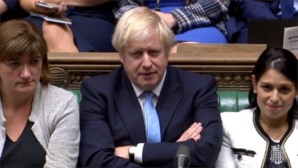 PM Boris Johnson (c) with Nicky Morgand and Priti Patel