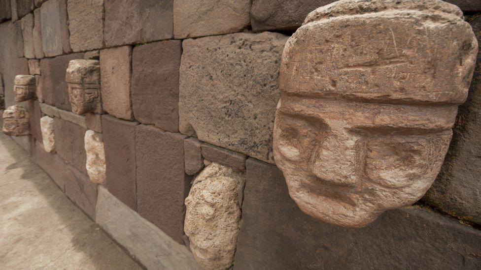 Close-up of a stone head at a Tiwanaku archaeological site