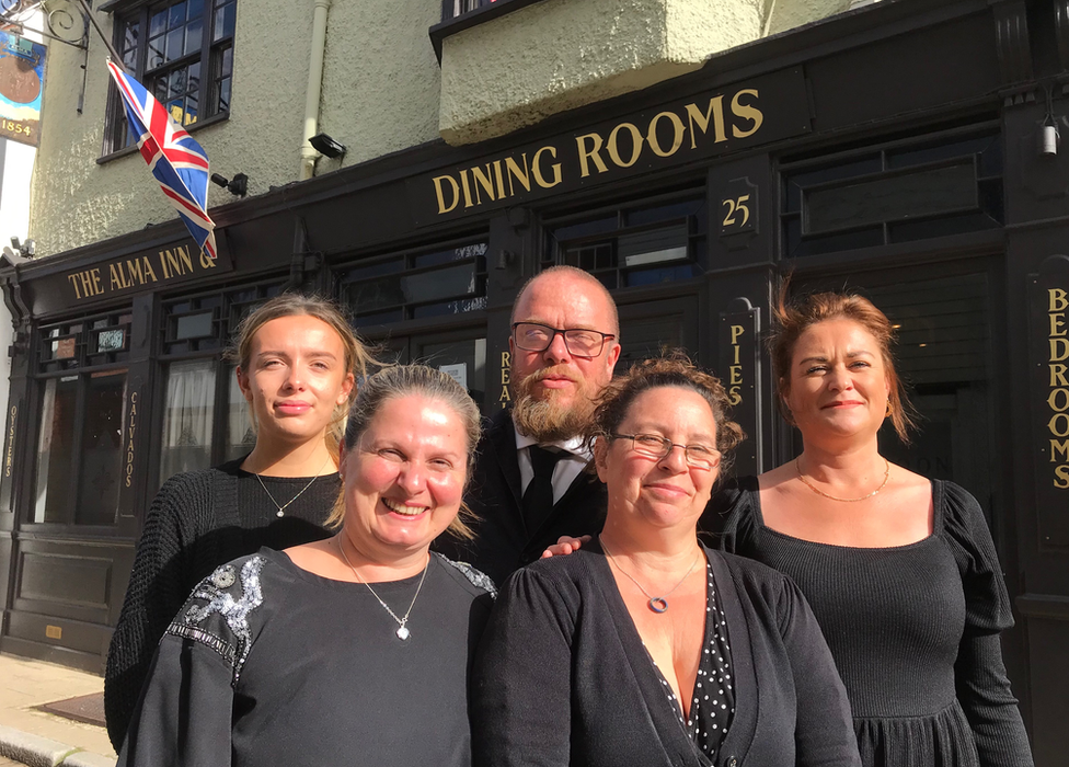 Staff outside the Alma Inn, Harwich