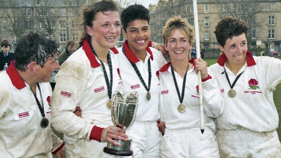 England's winning 1994 team celebrate with the trophy