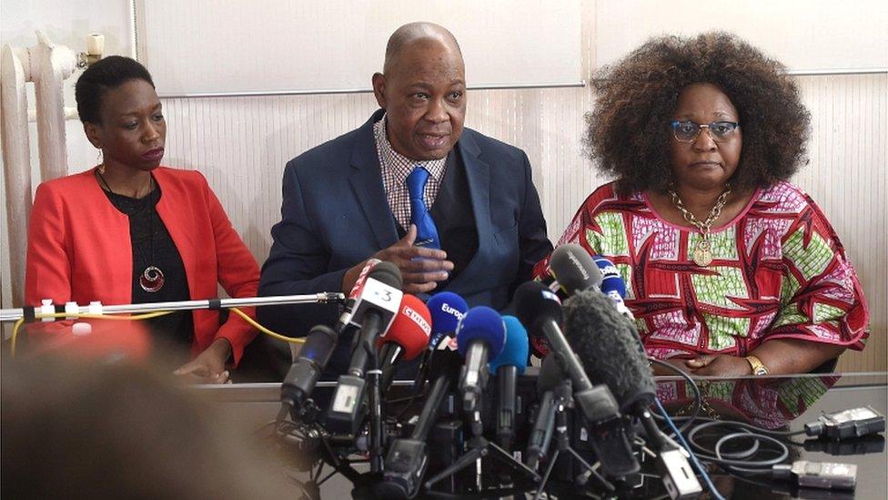 Naomi Musenga's, Louange, her father, Mukole, and her mother, Honorine, speak to journalists on 10 May 2018 in Strasbourg