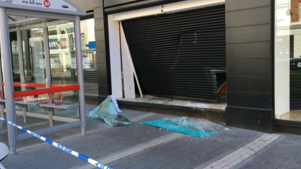 Smashed window at Flannels, Leeds