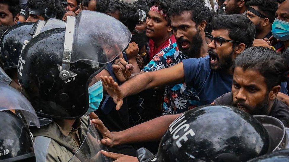 Protestors near Sri Lanka's parliament building in Colombo.