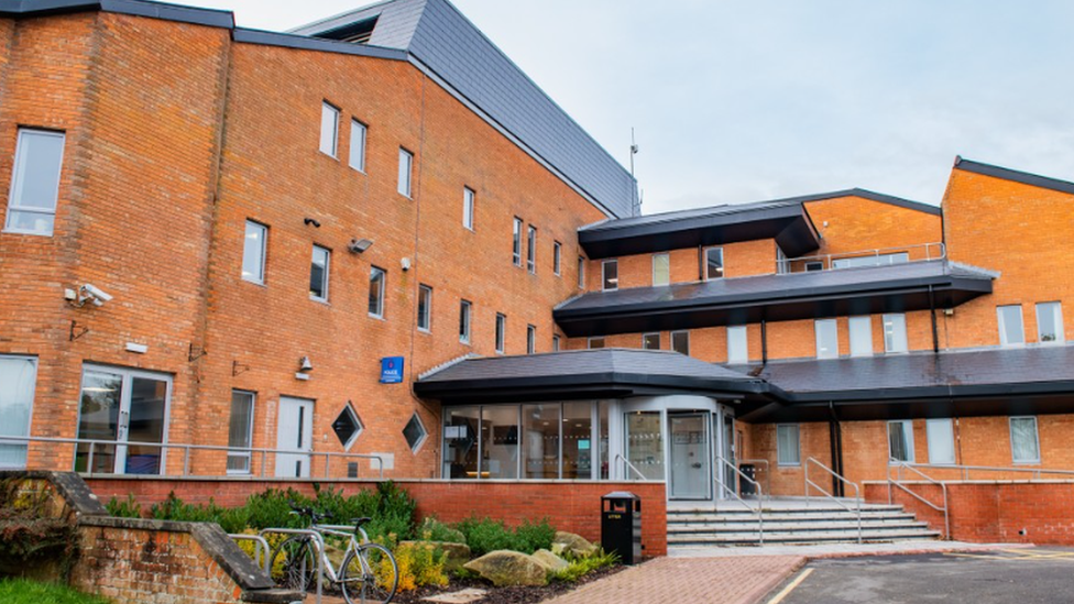 Tewkesbury Borough Council building, seen from outside with its front entrance and steps