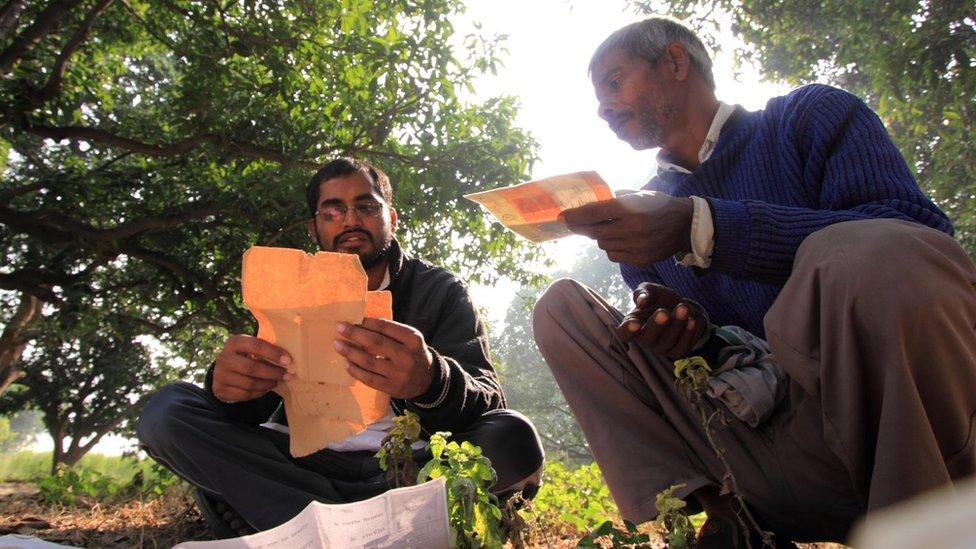 Mr Yadav speaking to villagers about RTI