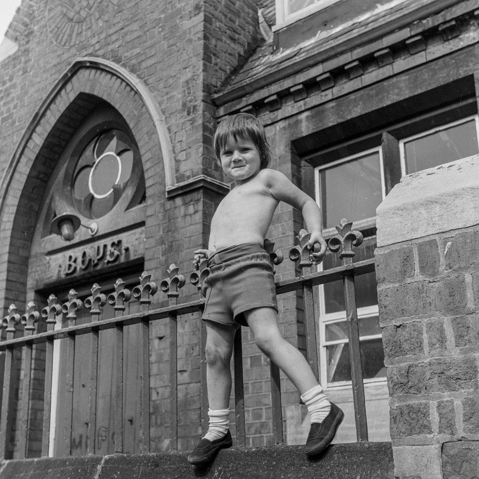 Geoffrey Shepherd on school railings