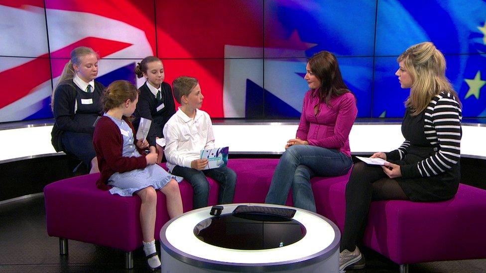 Katya and Jenny with children in the Newsround studio.