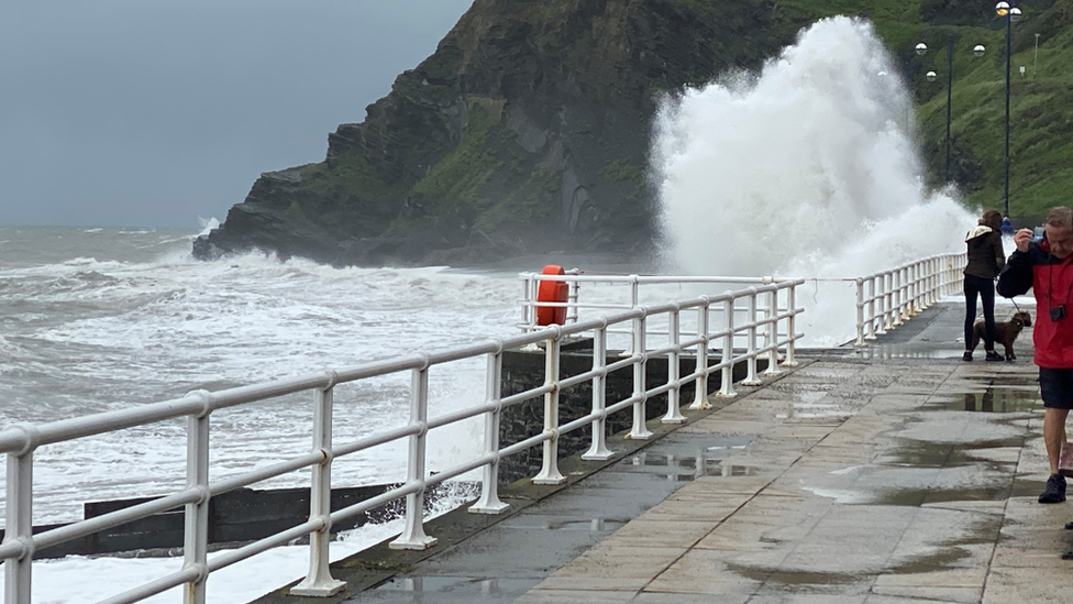 Waves crashing into Aberystwyth promenade