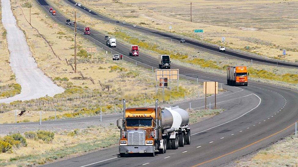 Long road lined with trucks