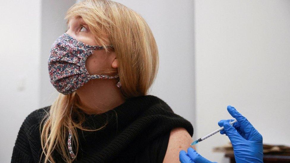 Woman having a vaccine