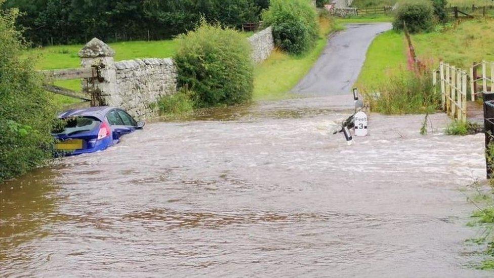 The flooded road at the Vale of Whittingham