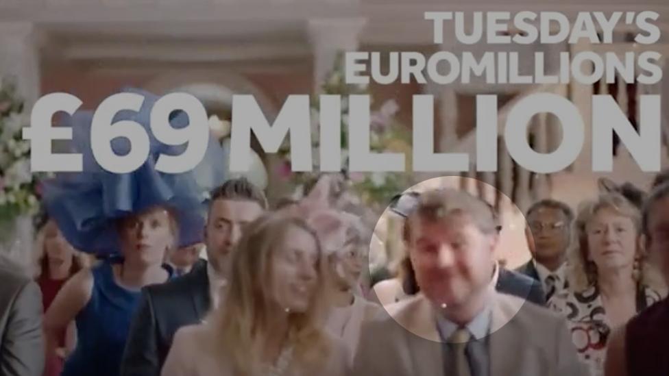 Simon Jones appears at the front (circled) of wedding guests in the advert