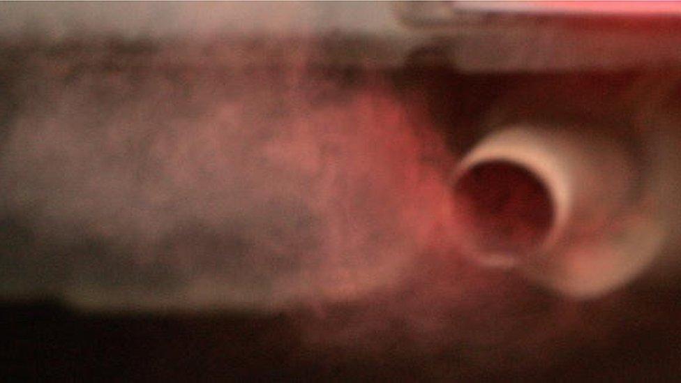 Exhaust fumes from an exhaust pipe