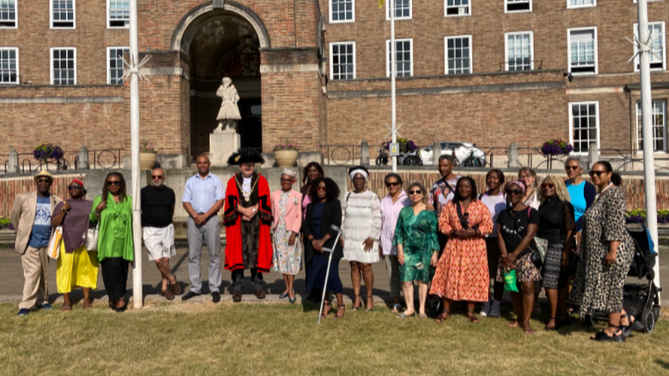 A group of people outside Bristol's City Hall