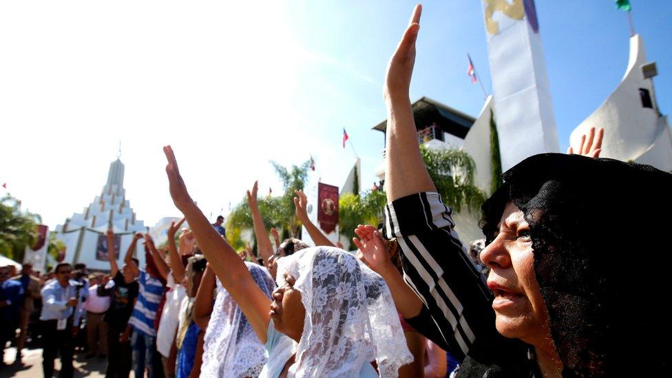 Followers of the Mexican-based Pentecostal church Light of the World, participate in a baptism ceremony in Guadalajara