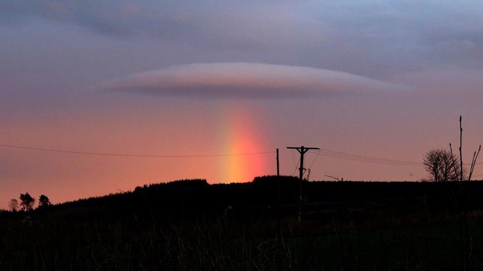 Cloud and rainbow