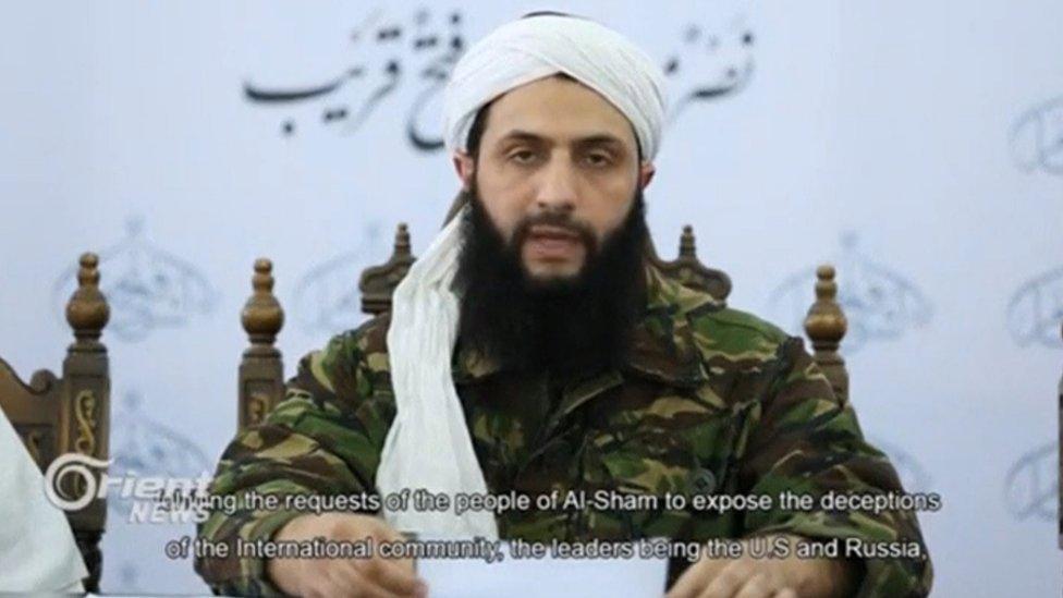 Screengrab from a video, showing Abu Mohammed al-Jawlani, the leader of the Syrian Islamist rebel group Jabhat Fateh al-Sham, formerly known as Nusra Front, delivering a statement