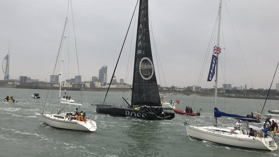 A cluster of boats gathered to welcome the Gosport sailor home