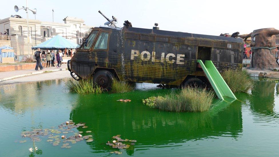 police van artwork at Dismaland