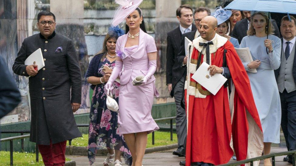 Katy Perry leaves Westminster Abbey following the coronation ceremony of King Charles III and Queen Camilla in central London.