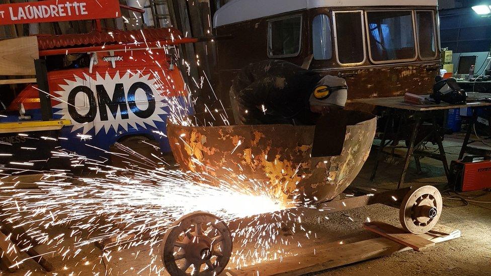 Rhys and Stewart Dungey causing sparks while working with cutting gear in their workshop