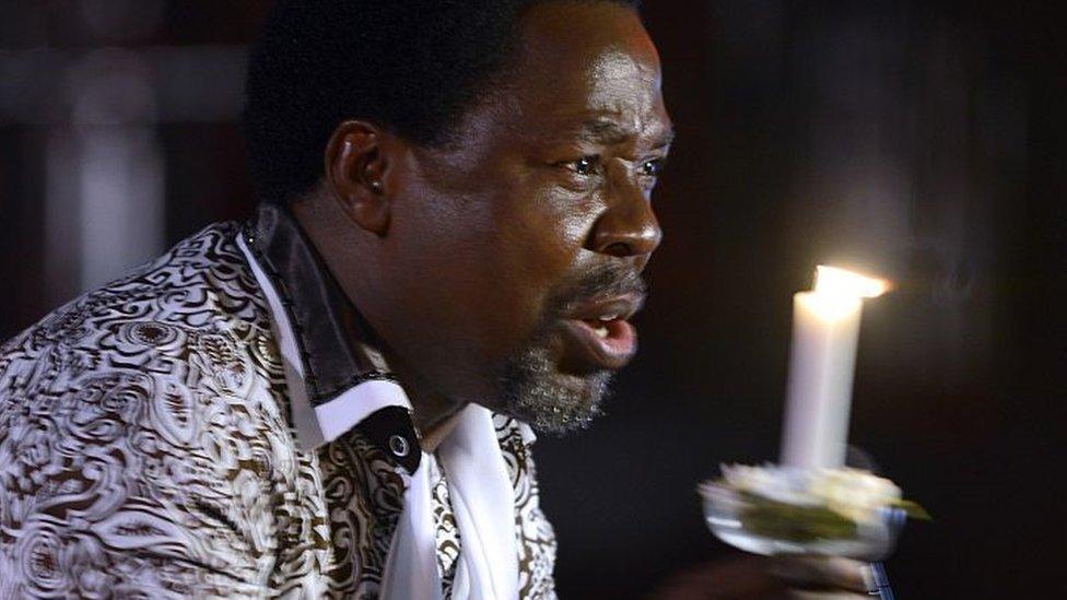 Nigerian pastor TB Joshua speaks during a New Year's memorial service for the South African relatives of those killed in a building collapse at his Lagos megachurch on December 31, 2014