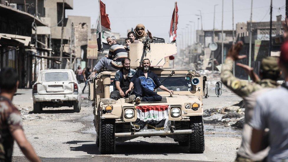 Iraqi citizens fleeing the Old City of Mosul, 23 June 2017