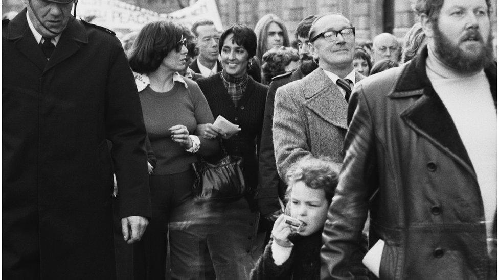 American folk singer Joan Baez (centre) at an Irish Peace People march in London, 6 December 1976