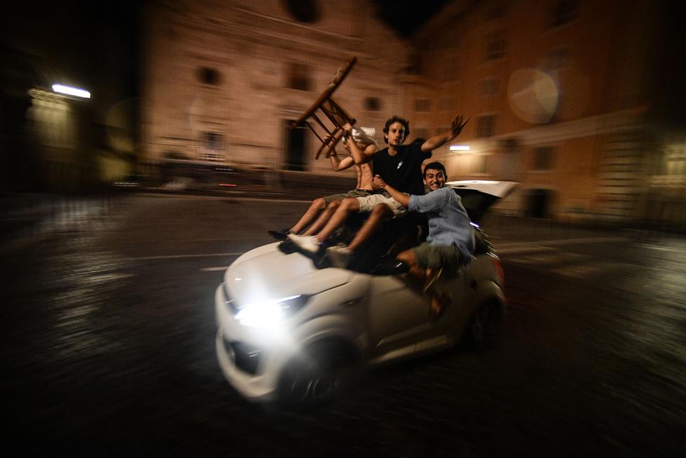 Supporter of the Italian national football team celebrate after Italy beat England 3-2 on penalty shootout to win the UEFA EURO 2020 final football match between England and Italy, in Rome on July 11, 2021.