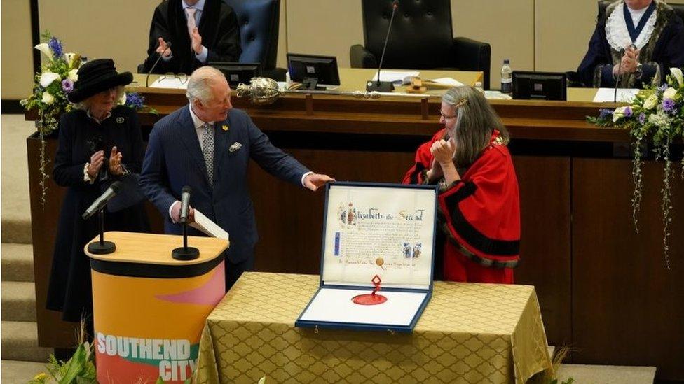 Prince Charles presents letters patent in a blue box to Southend marking it as a city