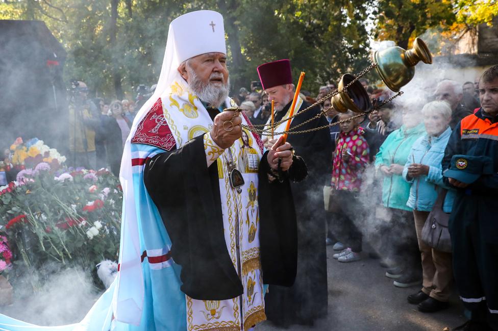 Priests and mourners at Kerch ceremony, 18 Oct 18