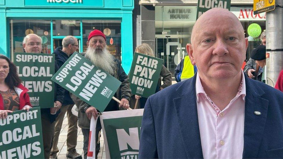 Seamus Dooley and members of the NUJ striking outside Arthur House