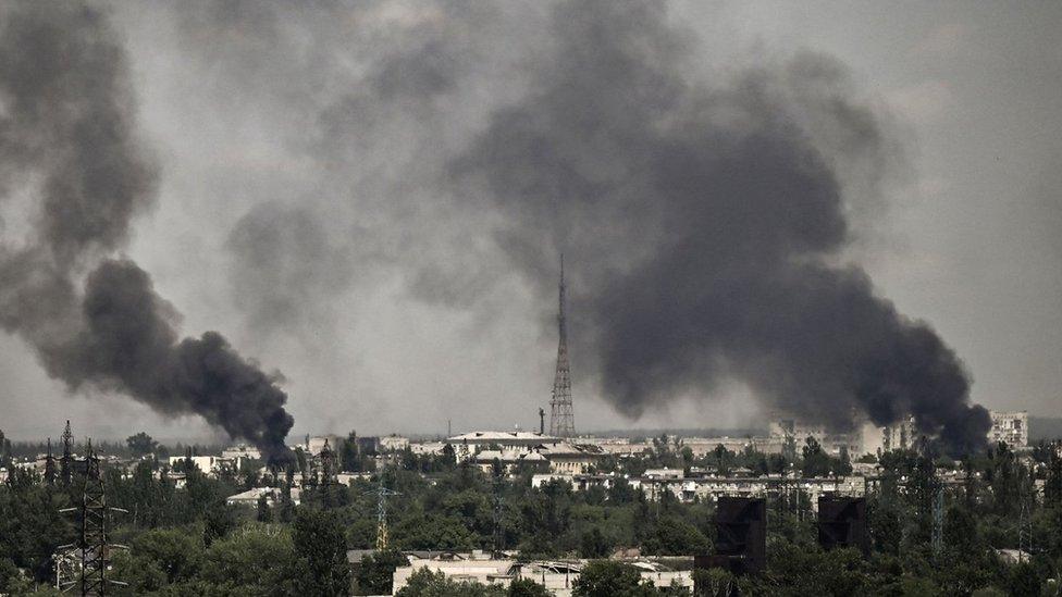 Smoke rises in the city of Severodonetsk during heavy fightings between Ukrainian and Russian troops