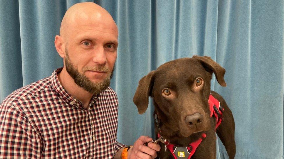 Patrick with his rescue dog, Dotty.